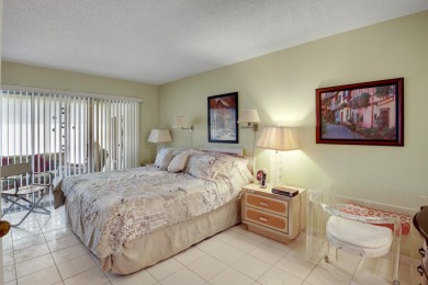 WELCOME TO THIS CONVENIENT 1ST FLOOR CONDO WITH BEAUTIFUL WATER on Poinciana Golf Club in Florida - for sale on GolfHomes.com, golf home, golf lot