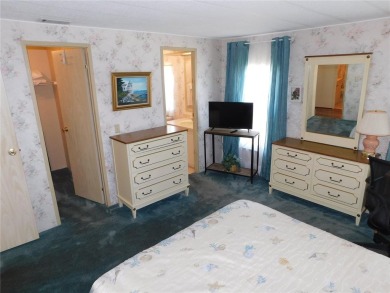 This charming, fully furnished home is perfect for both relaxing on Betmar Acres Golf Club in Florida - for sale on GolfHomes.com, golf home, golf lot