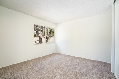 This lovely beach home resides in the center of the Huntington on Meadowlark Golf Club in California - for sale on GolfHomes.com, golf home, golf lot