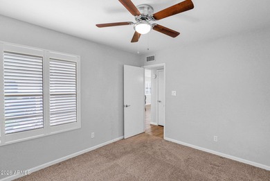 Welcome home to effortless living in Fountain of the Sun, a on Fountain of the Sun Country Club in Arizona - for sale on GolfHomes.com, golf home, golf lot