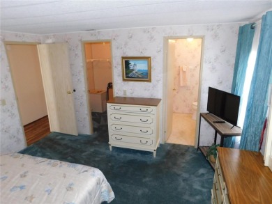 This charming, fully furnished home is perfect for both relaxing on Betmar Acres Golf Club in Florida - for sale on GolfHomes.com, golf home, golf lot