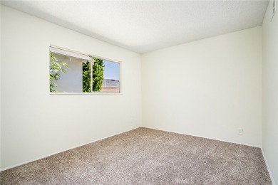 This lovely beach home resides in the center of the Huntington on Meadowlark Golf Club in California - for sale on GolfHomes.com, golf home, golf lot