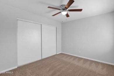 Welcome home to effortless living in Fountain of the Sun, a on Fountain of the Sun Country Club in Arizona - for sale on GolfHomes.com, golf home, golf lot