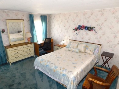 This charming, fully furnished home is perfect for both relaxing on Betmar Acres Golf Club in Florida - for sale on GolfHomes.com, golf home, golf lot
