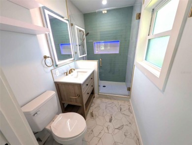 NO FLOOD ZONE-- Move-in ready with major upgrades already on St. Petersburg Country Club in Florida - for sale on GolfHomes.com, golf home, golf lot
