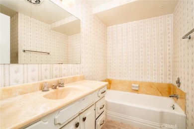This lovely beach home resides in the center of the Huntington on Meadowlark Golf Club in California - for sale on GolfHomes.com, golf home, golf lot