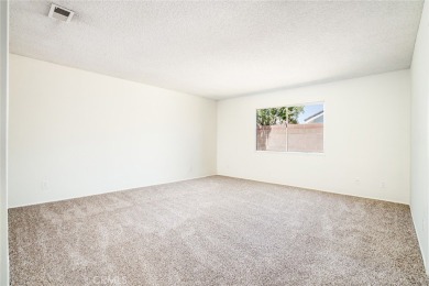This lovely beach home resides in the center of the Huntington on Meadowlark Golf Club in California - for sale on GolfHomes.com, golf home, golf lot