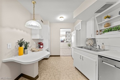 If you're looking for charm, comfort, and easy living, look no on Portage Country Club in Ohio - for sale on GolfHomes.com, golf home, golf lot