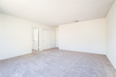 This lovely beach home resides in the center of the Huntington on Meadowlark Golf Club in California - for sale on GolfHomes.com, golf home, golf lot