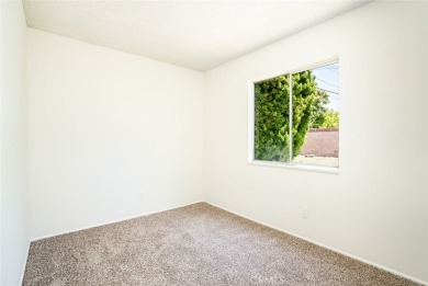 This lovely beach home resides in the center of the Huntington on Meadowlark Golf Club in California - for sale on GolfHomes.com, golf home, golf lot