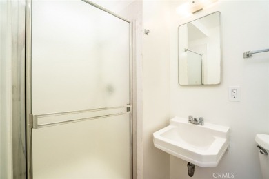 This lovely beach home resides in the center of the Huntington on Meadowlark Golf Club in California - for sale on GolfHomes.com, golf home, golf lot