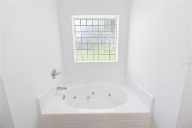 Welcome to this SPACIOUS 4 Bedroom, 3 Bathroom, 2-Car Garage on Deep Creek Golf Club in Florida - for sale on GolfHomes.com, golf home, golf lot