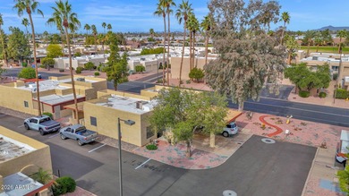 Welcome home to effortless living in Fountain of the Sun, a on Fountain of the Sun Country Club in Arizona - for sale on GolfHomes.com, golf home, golf lot