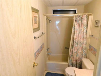 This charming, fully furnished home is perfect for both relaxing on Betmar Acres Golf Club in Florida - for sale on GolfHomes.com, golf home, golf lot