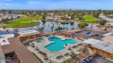 Welcome home to effortless living in Fountain of the Sun, a on Fountain of the Sun Country Club in Arizona - for sale on GolfHomes.com, golf home, golf lot