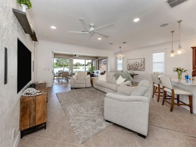 Experience the Florida lifestyle in this elegant Donatello model on Venetian Golf and River Club in Florida - for sale on GolfHomes.com, golf home, golf lot