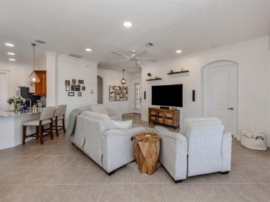 Experience the Florida lifestyle in this elegant Donatello model on Venetian Golf and River Club in Florida - for sale on GolfHomes.com, golf home, golf lot