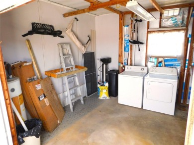 This charming, fully furnished home is perfect for both relaxing on Betmar Acres Golf Club in Florida - for sale on GolfHomes.com, golf home, golf lot