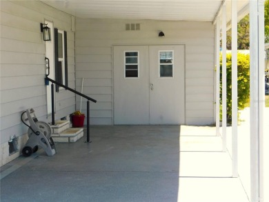 This charming, fully furnished home is perfect for both relaxing on Betmar Acres Golf Club in Florida - for sale on GolfHomes.com, golf home, golf lot