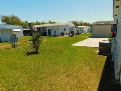 This charming, fully furnished home is perfect for both relaxing on Betmar Acres Golf Club in Florida - for sale on GolfHomes.com, golf home, golf lot