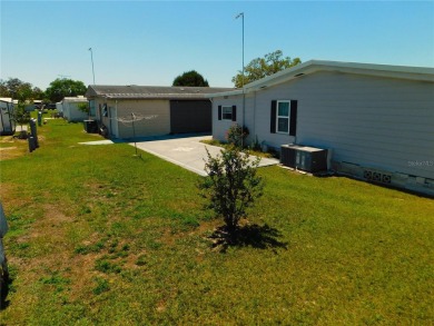 This charming, fully furnished home is perfect for both relaxing on Betmar Acres Golf Club in Florida - for sale on GolfHomes.com, golf home, golf lot