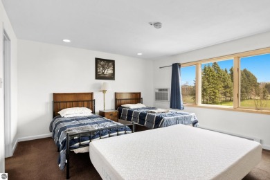 Welcome to your slice of Leelanau County. Tucked into the heart on Manitou Passage Golf Club in Michigan - for sale on GolfHomes.com, golf home, golf lot