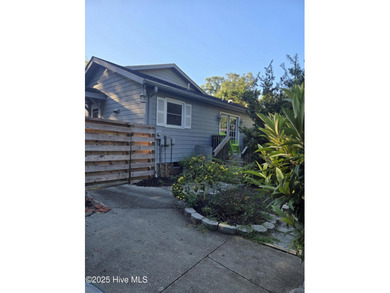 Some homes are unassuming from the outside and absolutely on Sea Trail Golf Resort in North Carolina - for sale on GolfHomes.com, golf home, golf lot