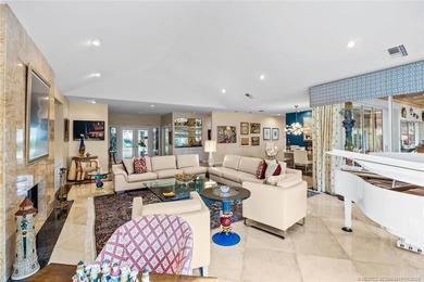 A truly exceptional offering within a secure gated enclave on Harbour Ridge Yacht and Country Club in Florida - for sale on GolfHomes.com, golf home, golf lot