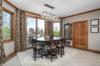 Welcome to 23790 Point O Woods Court, a beautifully designed on River Bank Golf Course in Michigan - for sale on GolfHomes.com, golf home, golf lot