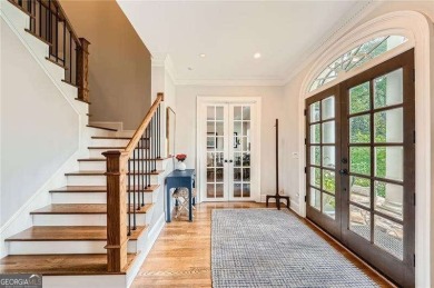 Set on a beautifully manicured 3/4-acre lot in East Cobb's on Atlanta Country Club in Georgia - for sale on GolfHomes.com, golf home, golf lot