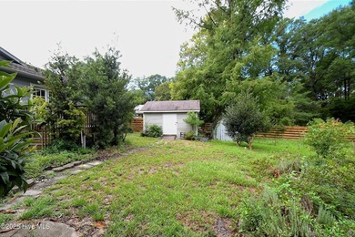 Some homes are unassuming from the outside and absolutely on Sea Trail Golf Resort in North Carolina - for sale on GolfHomes.com, golf home, golf lot
