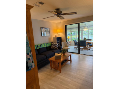This lovely, manufacture home is on leased land in Lake Fairways on Pine Lakes Country Club in Florida - for sale on GolfHomes.com, golf home, golf lot