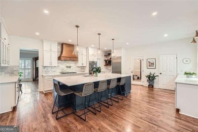 Set on a beautifully manicured 3/4-acre lot in East Cobb's on Atlanta Country Club in Georgia - for sale on GolfHomes.com, golf home, golf lot