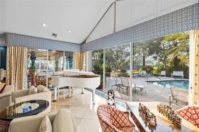 A truly exceptional offering within a secure gated enclave on Harbour Ridge Yacht and Country Club in Florida - for sale on GolfHomes.com, golf home, golf lot