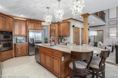 Welcome to 23790 Point O Woods Court, a beautifully designed on River Bank Golf Course in Michigan - for sale on GolfHomes.com, golf home, golf lot