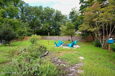 Some homes are unassuming from the outside and absolutely on Sea Trail Golf Resort in North Carolina - for sale on GolfHomes.com, golf home, golf lot