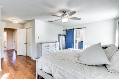 This 3-bedroom, 2-bathroom home is nestled in the highly coveted on Pecan Plantation Country Club in Texas - for sale on GolfHomes.com, golf home, golf lot
