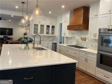 Set on a beautifully manicured 3/4-acre lot in East Cobb's on Atlanta Country Club in Georgia - for sale on GolfHomes.com, golf home, golf lot
