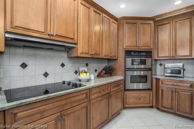 Welcome to 23790 Point O Woods Court, a beautifully designed on River Bank Golf Course in Michigan - for sale on GolfHomes.com, golf home, golf lot