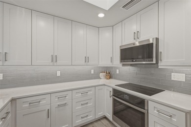 Embrace the island life style within the gates of Longboat Key's on Longboat Key Golf Club Resort in Florida - for sale on GolfHomes.com, golf home, golf lot