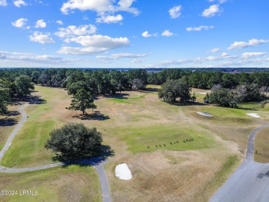 One of the few remaining waterfront  building lots in ever on The Golf Club at Pleasant Point Plantation in South Carolina - for sale on GolfHomes.com, golf home, golf lot