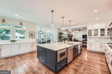 Set on a beautifully manicured 3/4-acre lot in East Cobb's on Atlanta Country Club in Georgia - for sale on GolfHomes.com, golf home, golf lot