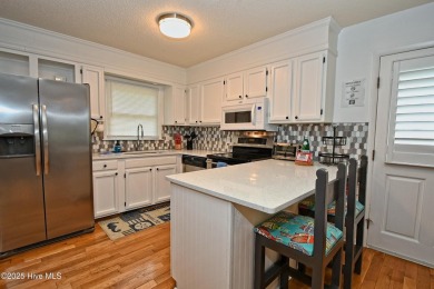 The perfect !  This sweet home has been lovingly renovated as a on Sea Trail Golf Resort in North Carolina - for sale on GolfHomes.com, golf home, golf lot