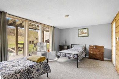 Welcome to your slice of Leelanau County. Tucked into the heart on Manitou Passage Golf Club in Michigan - for sale on GolfHomes.com, golf home, golf lot