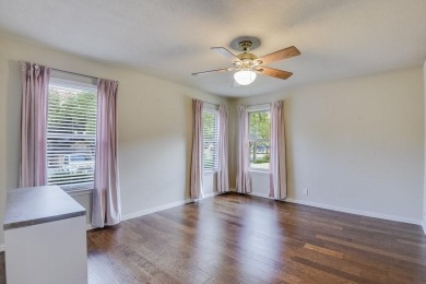 This 3-bedroom, 2-bathroom home is nestled in the highly coveted on Pecan Plantation Country Club in Texas - for sale on GolfHomes.com, golf home, golf lot
