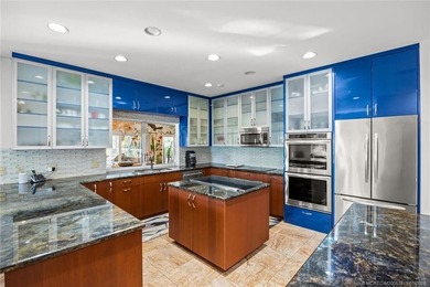 A truly exceptional offering within a secure gated enclave on Harbour Ridge Yacht and Country Club in Florida - for sale on GolfHomes.com, golf home, golf lot