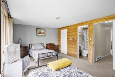 Welcome to your slice of Leelanau County. Tucked into the heart on Manitou Passage Golf Club in Michigan - for sale on GolfHomes.com, golf home, golf lot