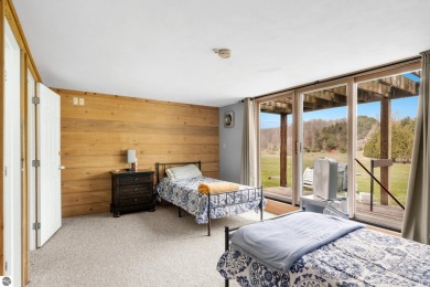 Welcome to your slice of Leelanau County. Tucked into the heart on Manitou Passage Golf Club in Michigan - for sale on GolfHomes.com, golf home, golf lot