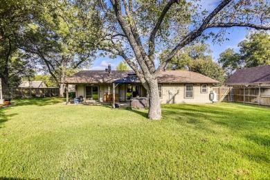 This 3-bedroom, 2-bathroom home is nestled in the highly coveted on Pecan Plantation Country Club in Texas - for sale on GolfHomes.com, golf home, golf lot
