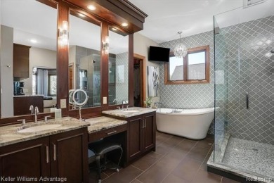 Welcome to 23790 Point O Woods Court, a beautifully designed on River Bank Golf Course in Michigan - for sale on GolfHomes.com, golf home, golf lot